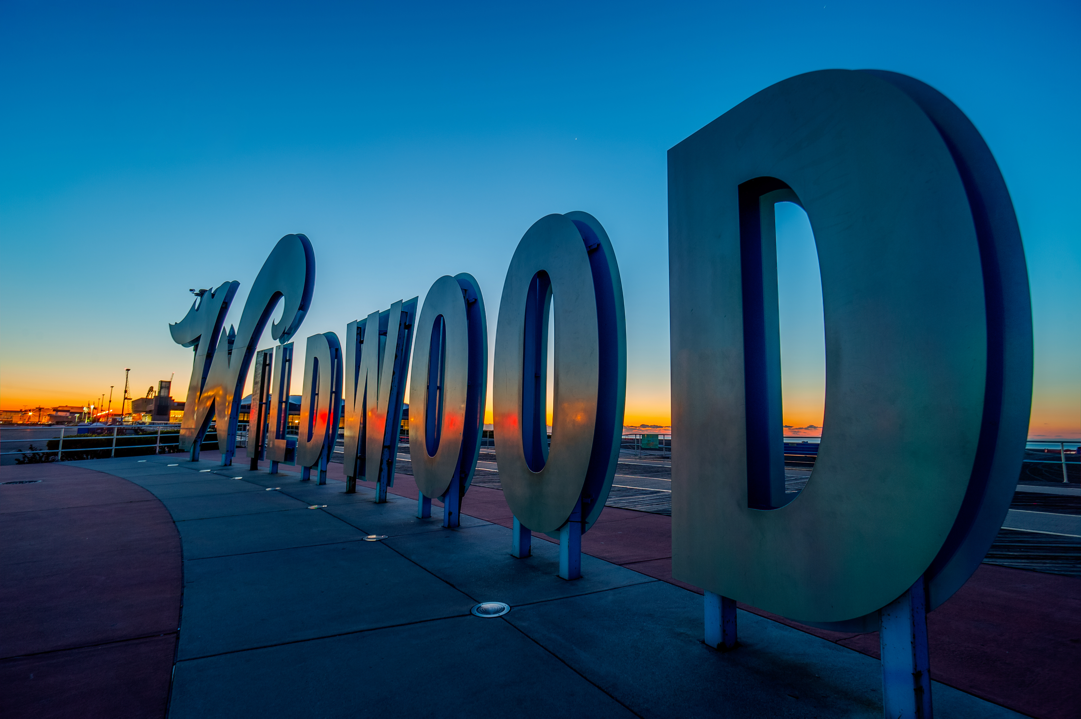 Wildwood sign at sunset near the boardwalk and beach